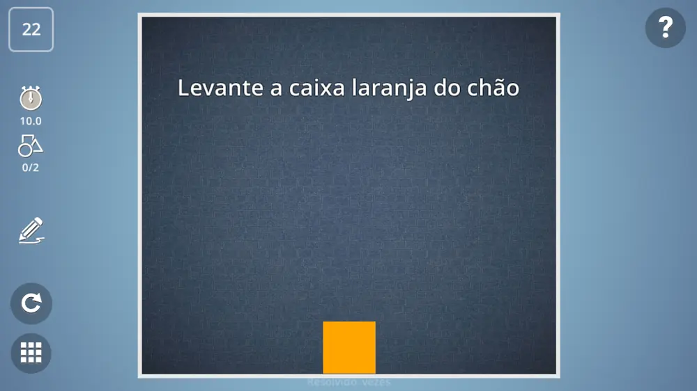 Ecrã de Brain It On! com o desafio 'Levante a caixa laranja do chão' e a caixa laranja pousada em baixo, à espera de uma solução